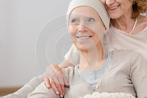 Cancer survivor lying in embrace photo