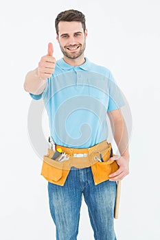 Happy carpenter gesturing thumbs up