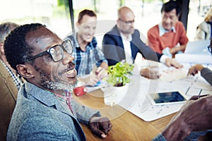 Happy and Casual Businessmen in a Conference