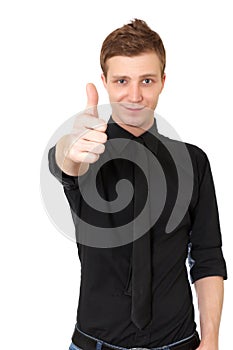 Happy casual young man showing thumb up