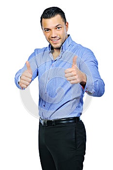 Happy casual young man showing thumb up