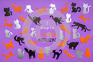 Happy Cat Day in Russia. Orange, black and grey funny cat silhouettes on lilac pastel background. Festive layout for feline