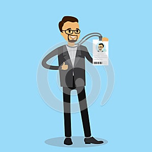 Happy caucasian businessman with badge or id card