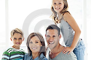 Happy caucasian family with two children - portrait