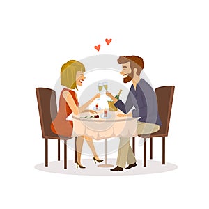 Happy cheerful couple in love on a romantic date in the restaurant having dinner