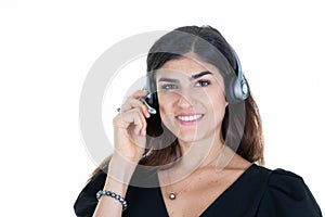 Happy cheerful happy call center consultant smiling woman with headset phone in white background