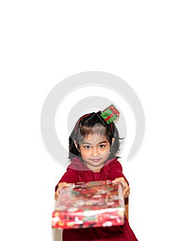 Happy cheerful little girl with gift box in a banner. Gift giving and gift sharing concept