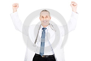 Happy cheerful male doctor with raised arms