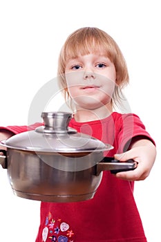 Happy chef girl stirring soup