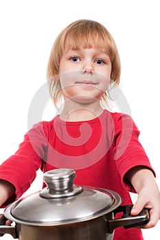 Happy chef girl stirring soup
