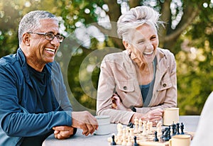 Happy, chess or couple of friends in nature playing a board game, bonding or talking about a funny story. Park, support