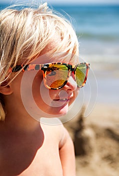 Happy chil on the beach photo