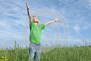 Happy child arms raised in prayer