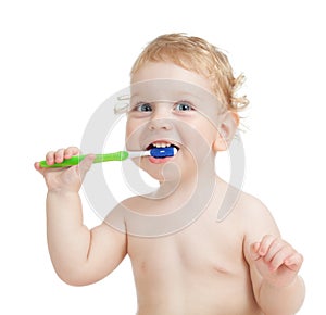 Happy child brushing teeth isolated