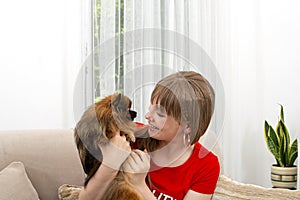 Happy child with dog. Portrait girl with pet