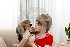 Happy child with dog. Portrait girl with pet