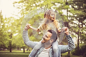 Happy child with father.