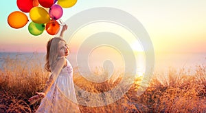 Happy Child In Freedom With Balloons