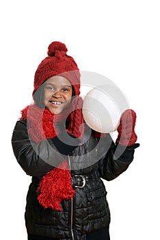 Happy child with giant snowball