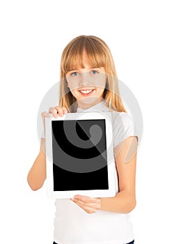 Happy child girl with blank tablet computer
