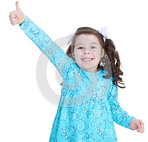 Happy child girl with hands thumbs up