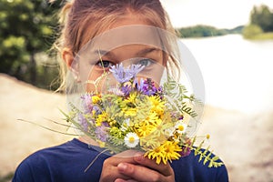 Happy child girl present flower bouquet concept happy childhood