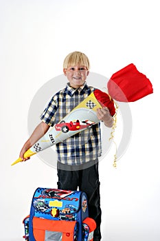 Happy child on his first schoolday