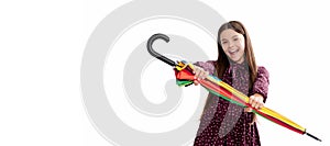 happy child hold colorful parasol. kid with rainbow umbrella isolated on white. Child with autumn umbrella, rainy