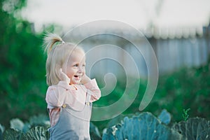 Happy Child Laugh In Cabbage Garden Summertime