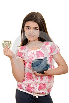 Happy child with money and piggy bank