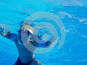 Happy child play on pool