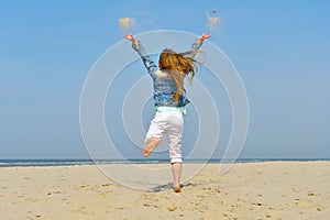 Happy Child playing on the beach