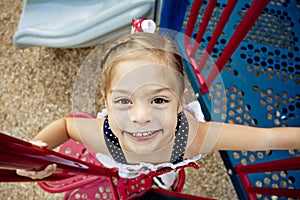 Happy Child Playing on Playground