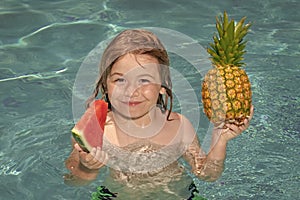 Happy child playing in swimming pool. Summer kids vacation. Summer pineapple amd watermelon fruit for children.