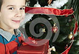 Happy child receive the gift of Christmas