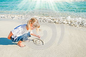 Happy child by the sea in the open air