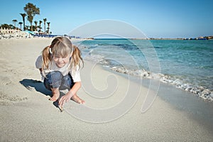 happy child by the sea in the open air