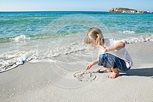 happy child by the sea in the open air