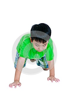 Happy child smiling and crawling on knees. Isolated on white background.