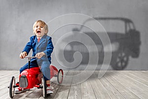 Happy child wants to race. Imagination, freedom and motivation concept.