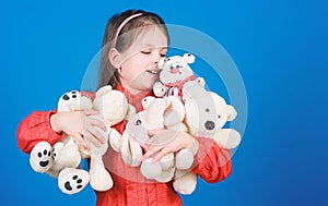 Happy childhood. Birthday. hugging a teddy bear. little girl playing game in playroom. toys for kid. small girl with
