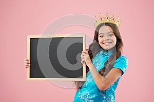 Happy childhood. cheerful princess hold school blackboard. School of success. school prom party advertising. Prom queen