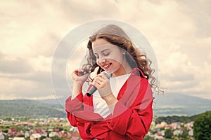 happy childhood. happy girl enjoy the moment. Have Fun on Celebration. teen kid singing with microphone in karaoke