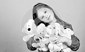 Happy childhood. Little girl play with soft toy teddy bear. Sweet childhood. Collecting toys hobby. Cherishing memories photo