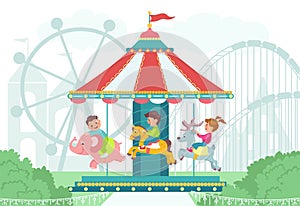 Happy children in amusement park. Happy kids on round carousel. Boys or girls ride merry-go-round. Different attraction