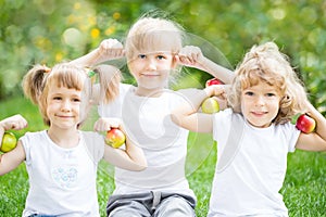 Happy children with apples