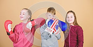 Happy children in boxing gloves. Fitness diet. energy health. punching knockout. Childhood activity. Sport success. Team