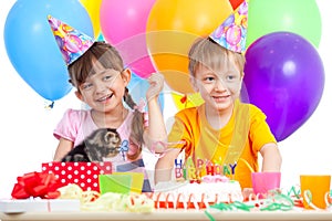 Happy children celebrating birthday party