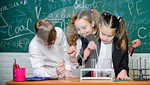 Happy children. Chemistry lesson. Little kids learning chemistry. students doing biology experiments with microscope in