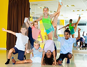 Happy children in dance studio smiling and having fun